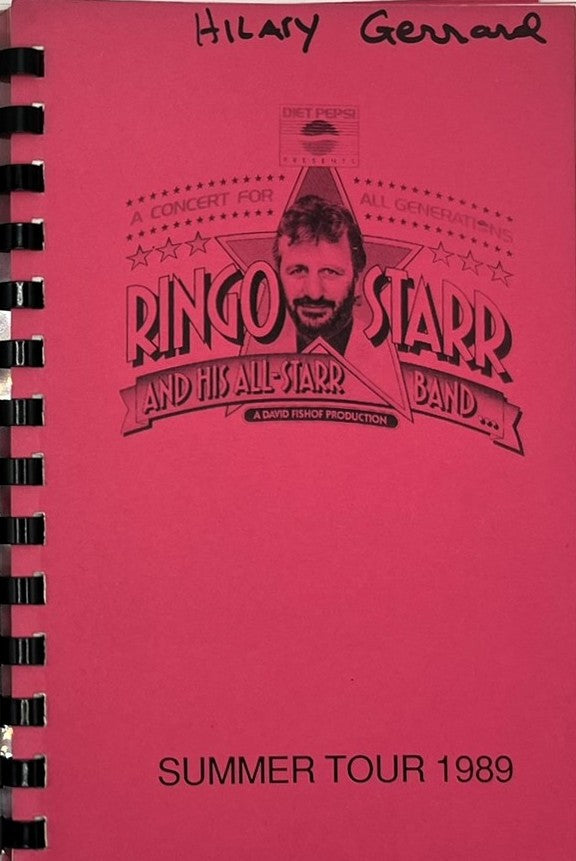A pink spiral-bound booklet or album cover for Ringo Starr and his all-star band, with black printed graphics and text including 'Hilary Gerrard' at the top and 'Summer Tour 1989' at the bottom.