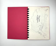 An open spiral-bound tour programme for Ringo Starr's All Starr Band on a white background, showing a solid magenta-pink left page and an off-white right page with a hand-drawn map and handwritten text.
