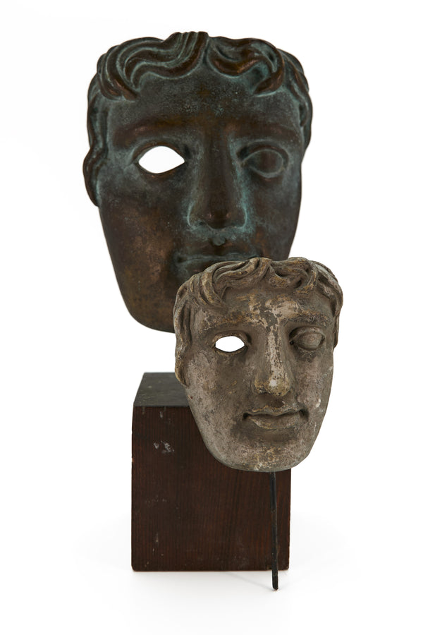 Two prototype maquettes of the BAFTA mask