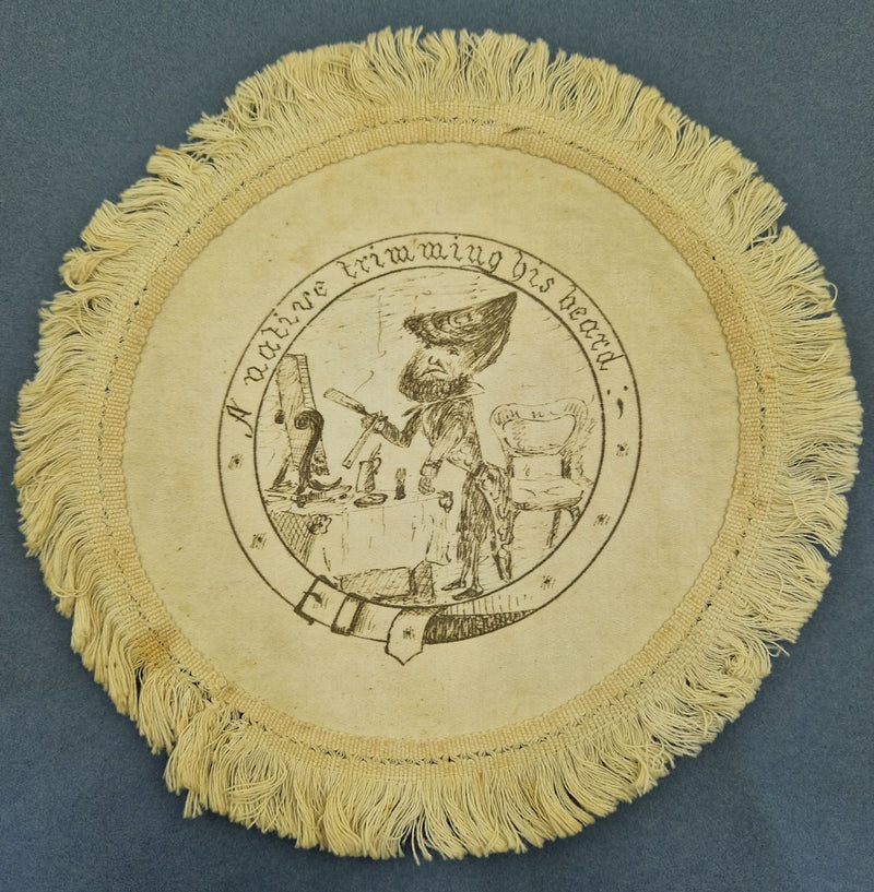 "A Specimen of the Darwinian race" and "A native trimming his beard" . Two illustrated cotton mats